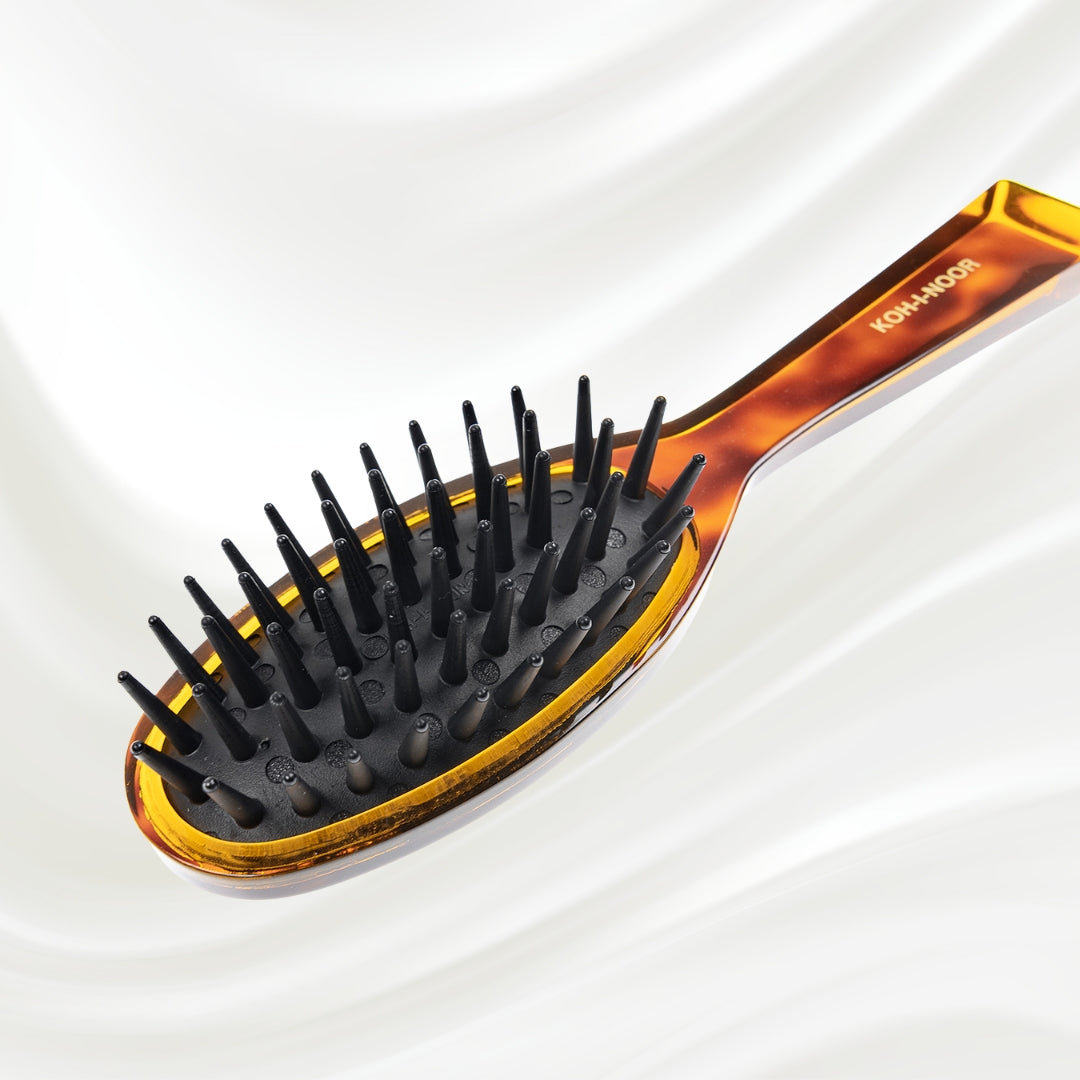 106 KOH-I-NOOR Jaspe large oval hairbrush with brown tortoiseshell acetate handle, and black detangling rubber pins; KOH-I-NOOR's gold logo stamped on the handle
