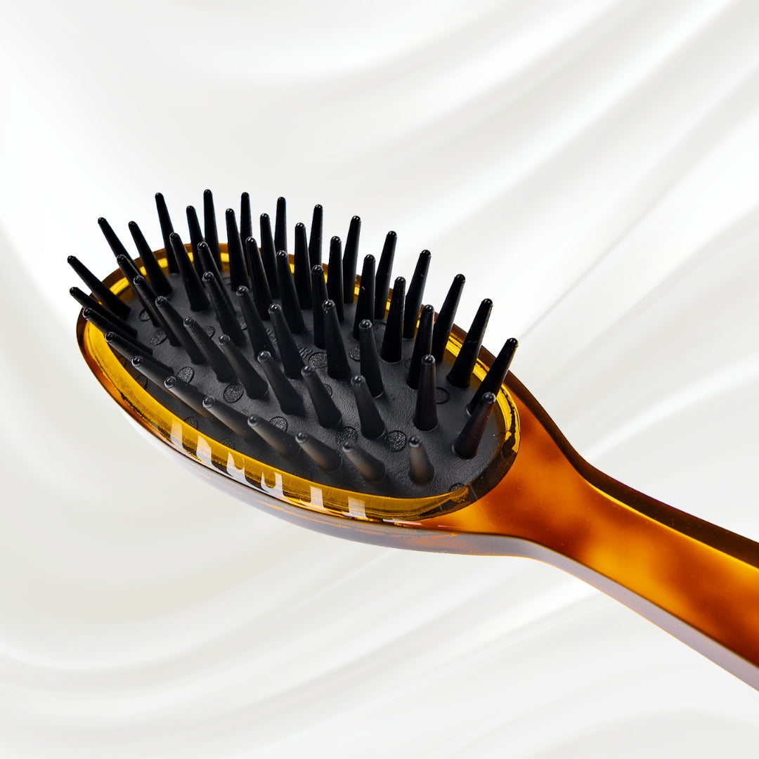 106 KOH-I-NOOR Jaspe large oval hairbrush with brown tortoiseshell acetate handle, and black detangling rubber pins; KOH-I-NOOR's gold logo stamped on the handle