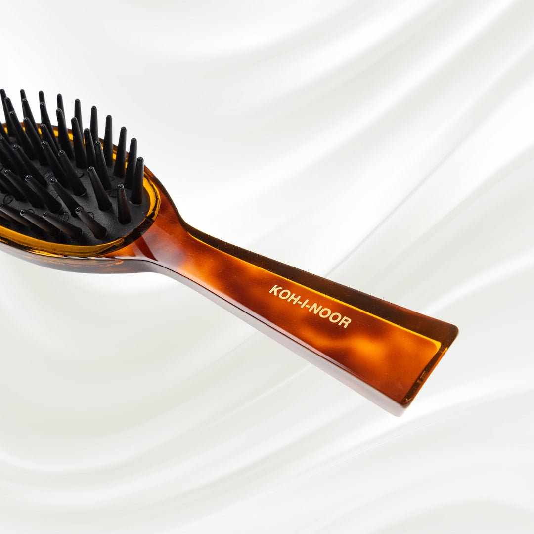 106 KOH-I-NOOR Jaspe large oval hairbrush with brown tortoiseshell acetate handle, and black detangling rubber pins; KOH-I-NOOR's gold logo stamped on the handle