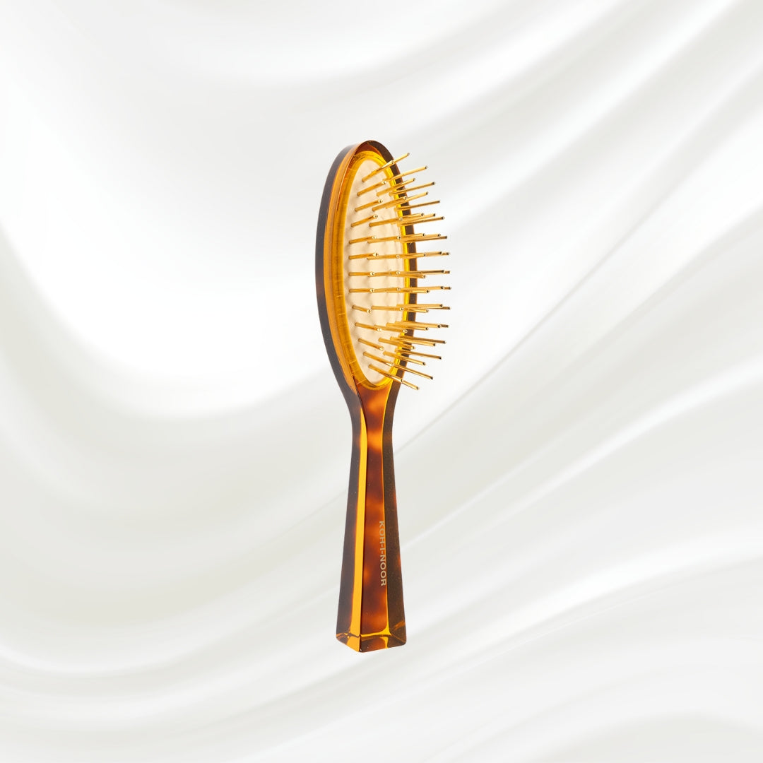 107G KOH-I-NOOR Jaspe small oval hairbrush with brown tortoiseshell acetate handle, and gold pins; KOH-I-NOOR's gold logo stamped on the handle