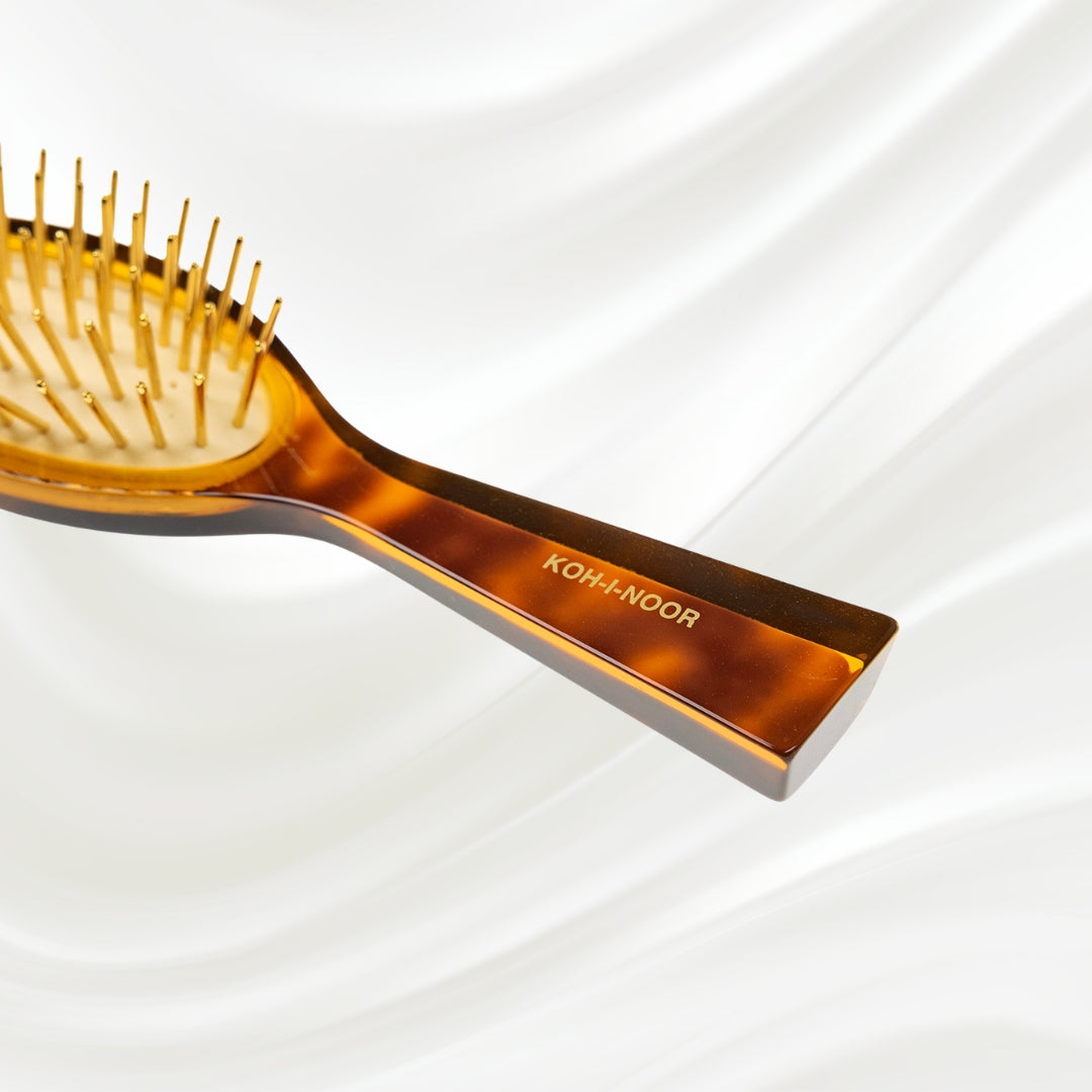 107G KOH-I-NOOR Jaspe small oval hairbrush with brown tortoiseshell acetate handle, and gold pins; KOH-I-NOOR's gold logo stamped on the handle