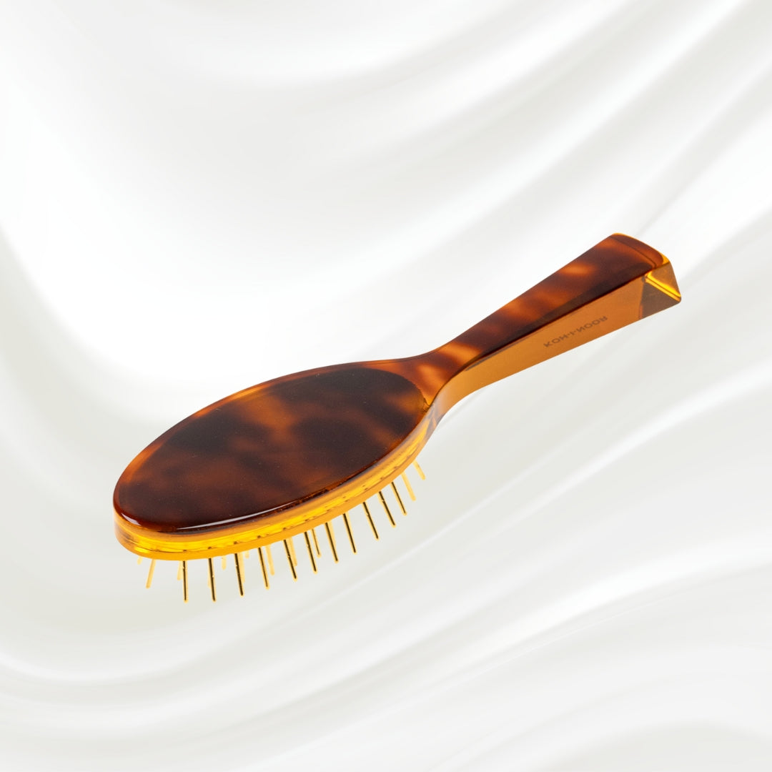 107G KOH-I-NOOR Jaspe small oval hairbrush with brown tortoiseshell acetate handle, and gold pins; KOH-I-NOOR's gold logo stamped on the handle