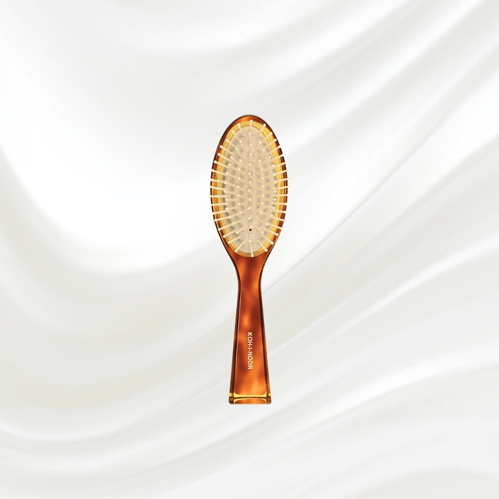 107G KOH-I-NOOR Jaspe small oval hairbrush with brown tortoiseshell acetate handle, and synthetic pins; KOH-I-NOOR's gold logo stamped on the handle