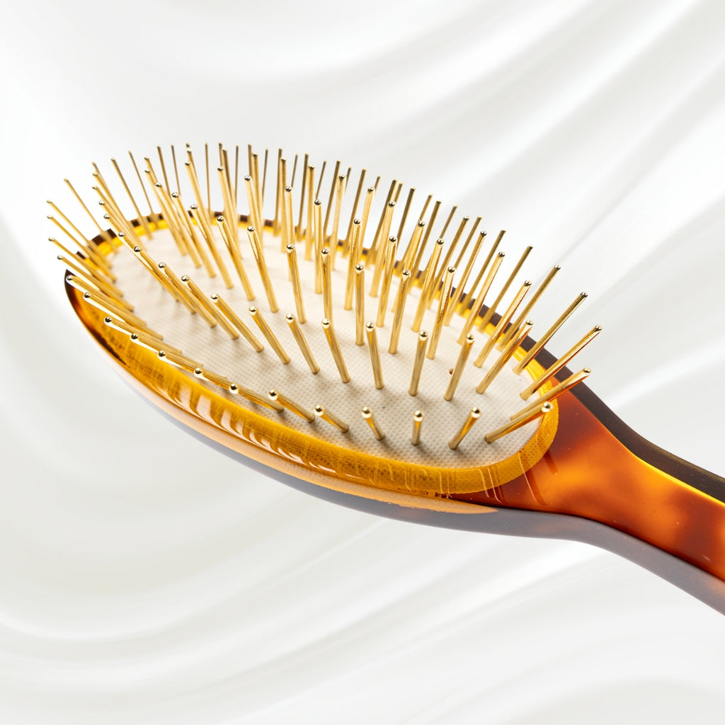 109G KOH-I-NOOR Jaspe large oval hairbrush with brown tortoiseshell acetate handle, and gold pins; KOH-I-NOOR's gold logo stamped on the handle