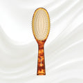 109G KOH-I-NOOR Jaspe large oval hairbrush with brown tortoiseshell acetate handle, and gold pins; KOH-I-NOOR's gold logo stamped on the handle