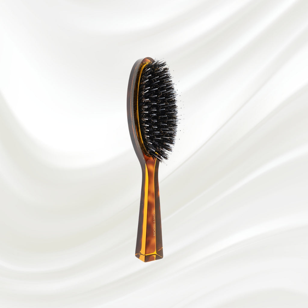 120 KOH-I-NOOR Jaspe small oval hairbrush with brown tortoiseshell acetate handle, black boar bristles and nylon pins; KOH-I-NOOR's gold logo stamped on the handle