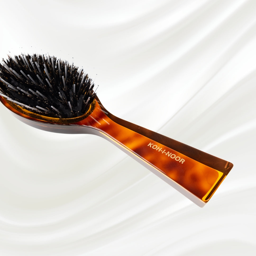 120 KOH-I-NOOR Jaspe small oval hairbrush with brown tortoiseshell acetate handle, black boar bristles and nylon pins; KOH-I-NOOR's gold logo stamped on the handle