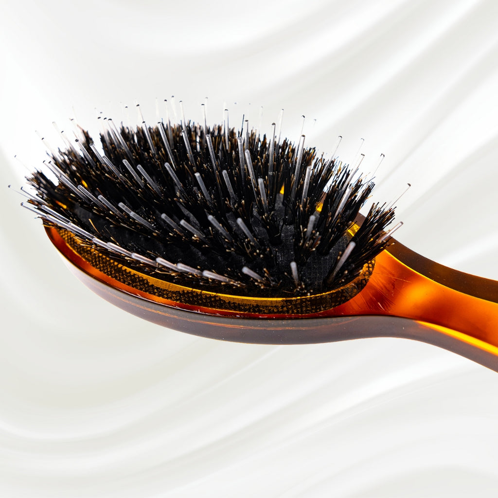 120 KOH-I-NOOR Jaspe small oval hairbrush with brown tortoiseshell acetate handle, black boar bristles and nylon pins; KOH-I-NOOR's gold logo stamped on the handle