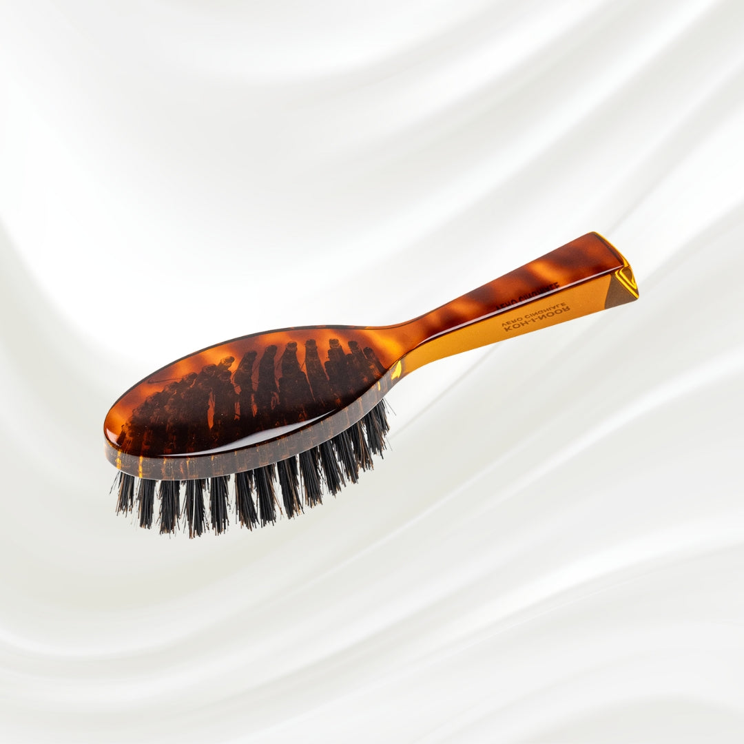 120 KOH-I-NOOR Jaspe small oval hairbrush with brown tortoiseshell acetate handle, black boar bristles and nylon pins; KOH-I-NOOR's gold logo stamped on the handle
