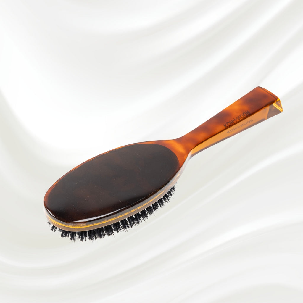122 KOH-I-NOOR Jaspe large oval hairbrush with brown tortoiseshell acetate handle, black boar bristles and nylon pins; KOH-I-NOOR's gold logo stamped on the handle