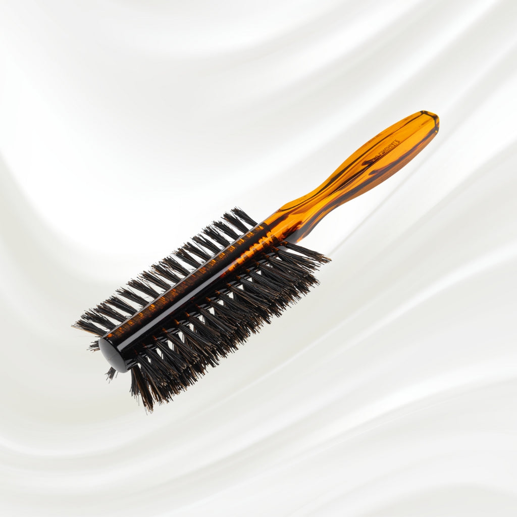 123 KOH-I-NOOR round styling hairbrush with brown tortoiseshell acetate handle and black boar bristles; KOH-I-NOOR's gold logo stamped on the handle