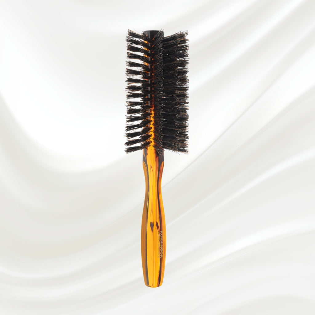 123 KOH-I-NOOR round styling hairbrush with brown tortoiseshell acetate handle and black boar bristles; KOH-I-NOOR's gold logo stamped on the handle