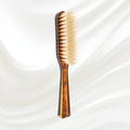 124B KOH-I-NOOR small rectangular hairbrush with brown tortoiseshell acetate handle and white natural bristles; KOH-I-NOOR's gold logo stamped on the handle