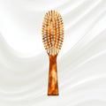 126 KOH-I-NOOR large oval hairbrush with brown tortoiseshell acetate handle and white natural bristles; KOH-I-NOOR's gold logo stamped on the handle