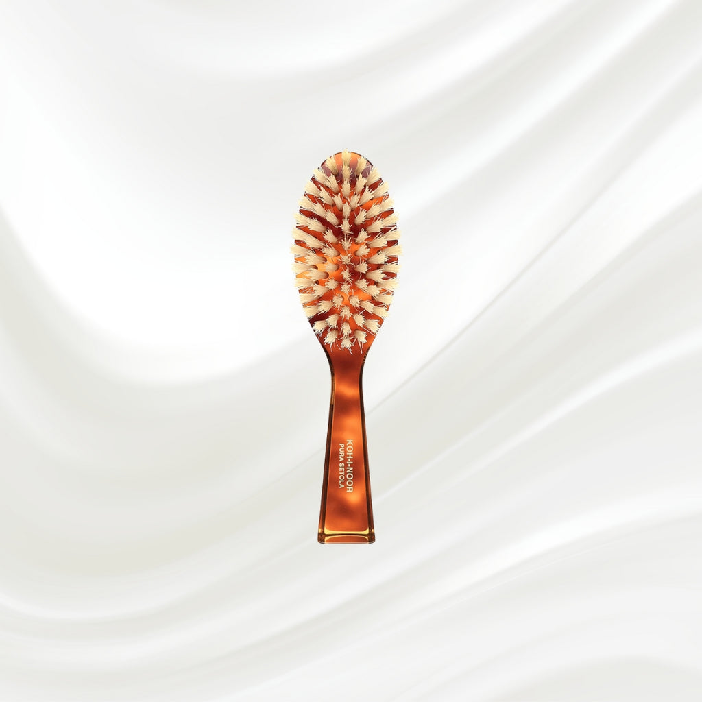 203B KOH-I-NOOR small oval hairbrush with brown tortoiseshell acetate handle and white natural bristles; KOH-I-NOOR's gold logo stamped on the handle