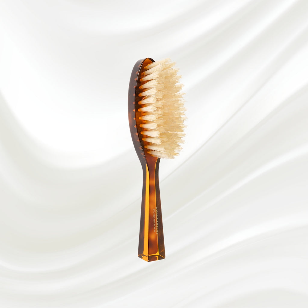 203B KOH-I-NOOR small oval hairbrush with brown tortoiseshell acetate handle and white natural bristles; KOH-I-NOOR's gold logo stamped on the handle
