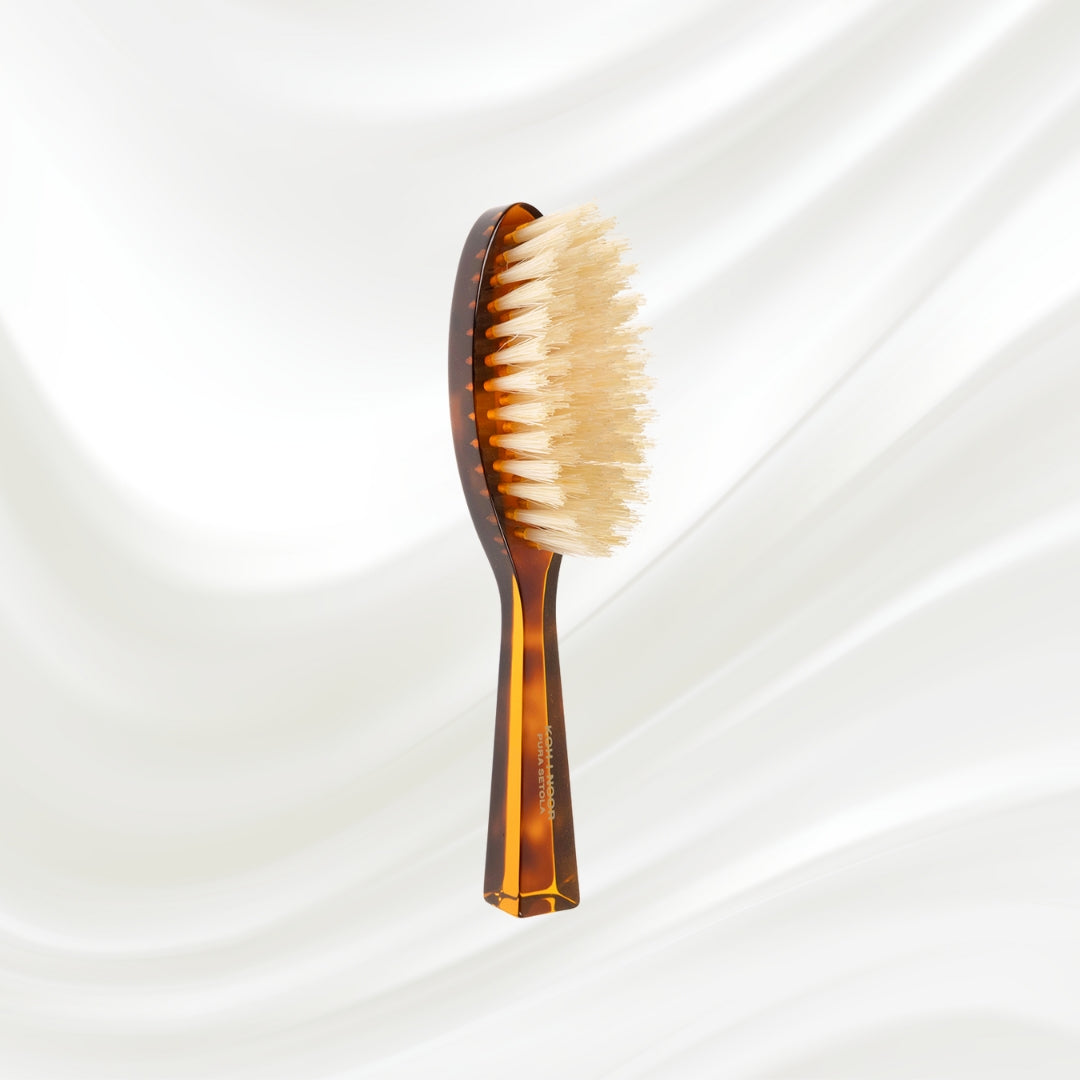 203B KOH-I-NOOR small oval hairbrush with brown tortoiseshell acetate handle and white natural bristles; KOH-I-NOOR's gold logo stamped on the handle