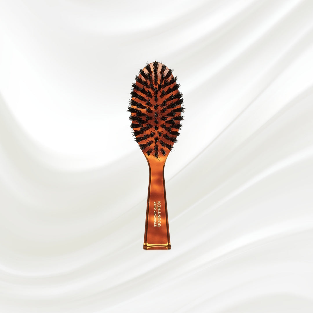 203 KOH-I-NOOR small oval hairbrush with brown tortoiseshell acetate handle and black boar bristles; KOH-I-NOOR's gold logo stamped on the handle