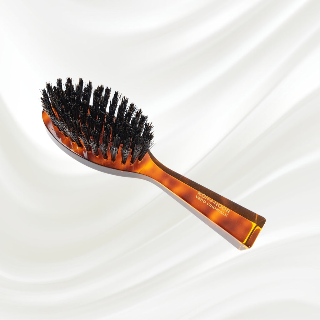 203 KOH-I-NOOR small oval hairbrush with brown tortoiseshell acetate handle and black boar bristles; KOH-I-NOOR's gold logo stamped on the handle