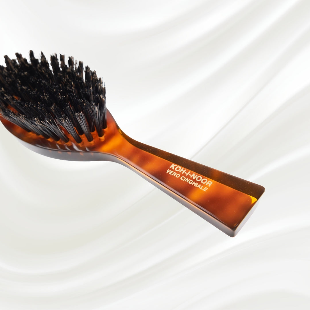 203 KOH-I-NOOR small oval hairbrush with brown tortoiseshell acetate handle and black boar bristles; KOH-I-NOOR's gold logo stamped on the handle