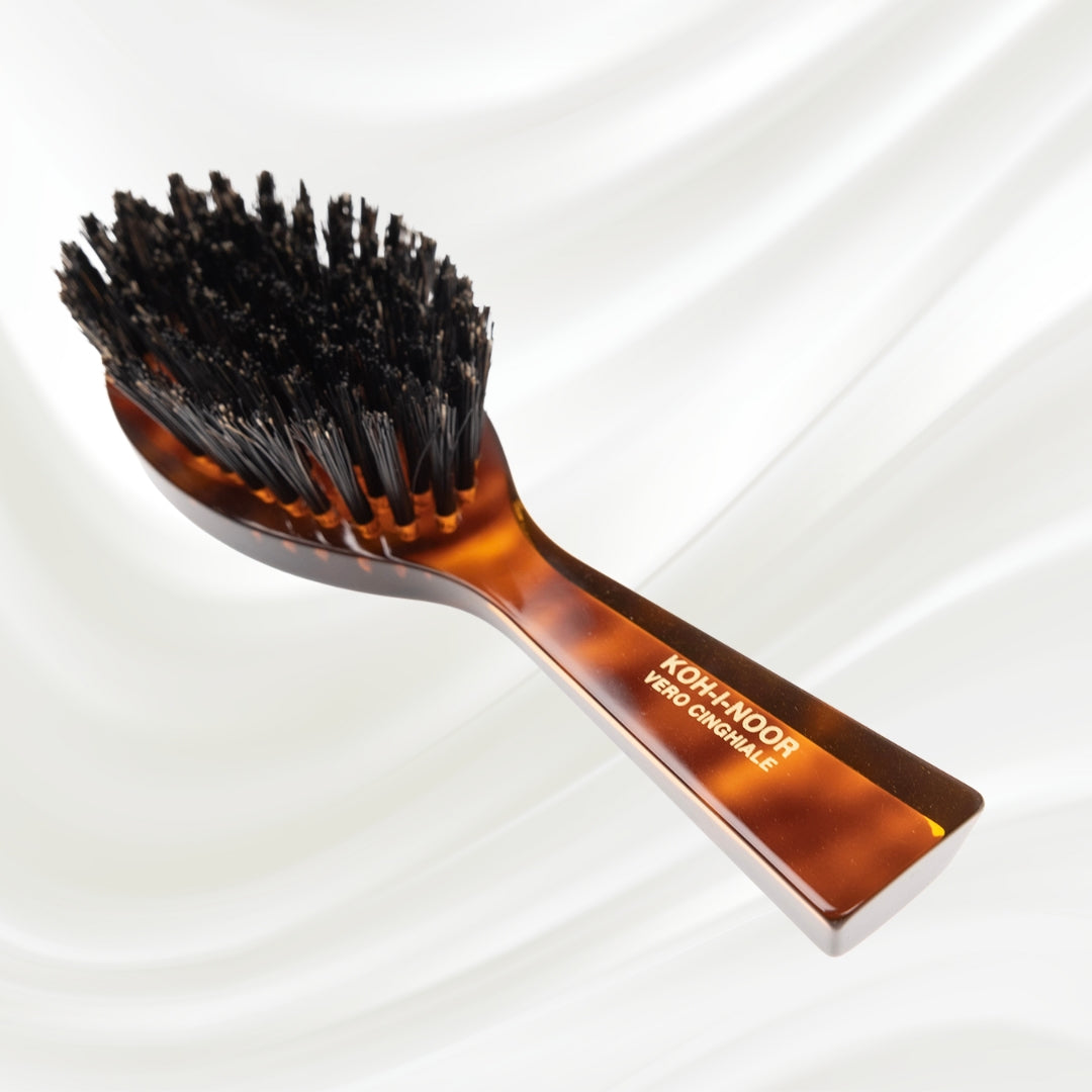 203 KOH-I-NOOR small oval hairbrush with brown tortoiseshell acetate handle and black boar bristles; KOH-I-NOOR's gold logo stamped on the handle