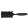 Black round hairbrush on a white background