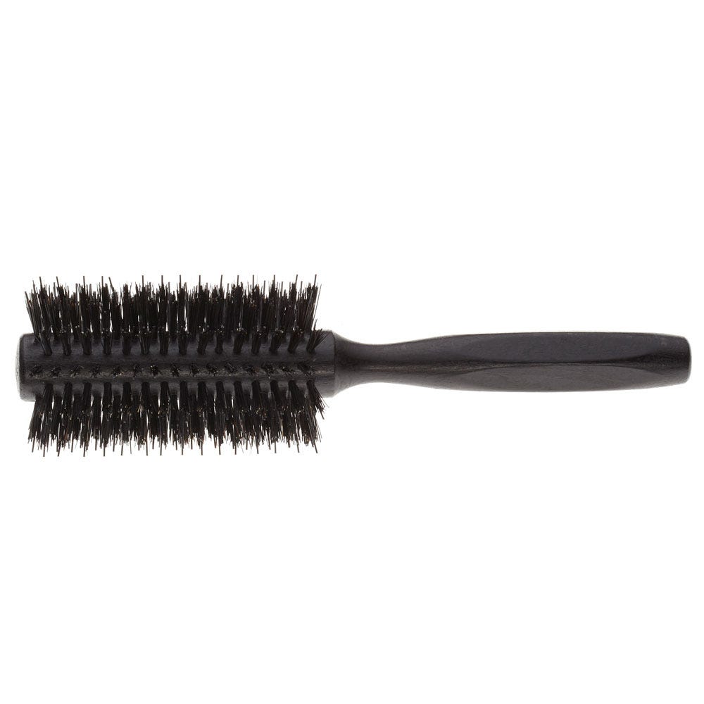 Black round hairbrush on a white background