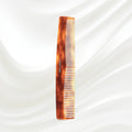 Tortoiseshell comb on a white background