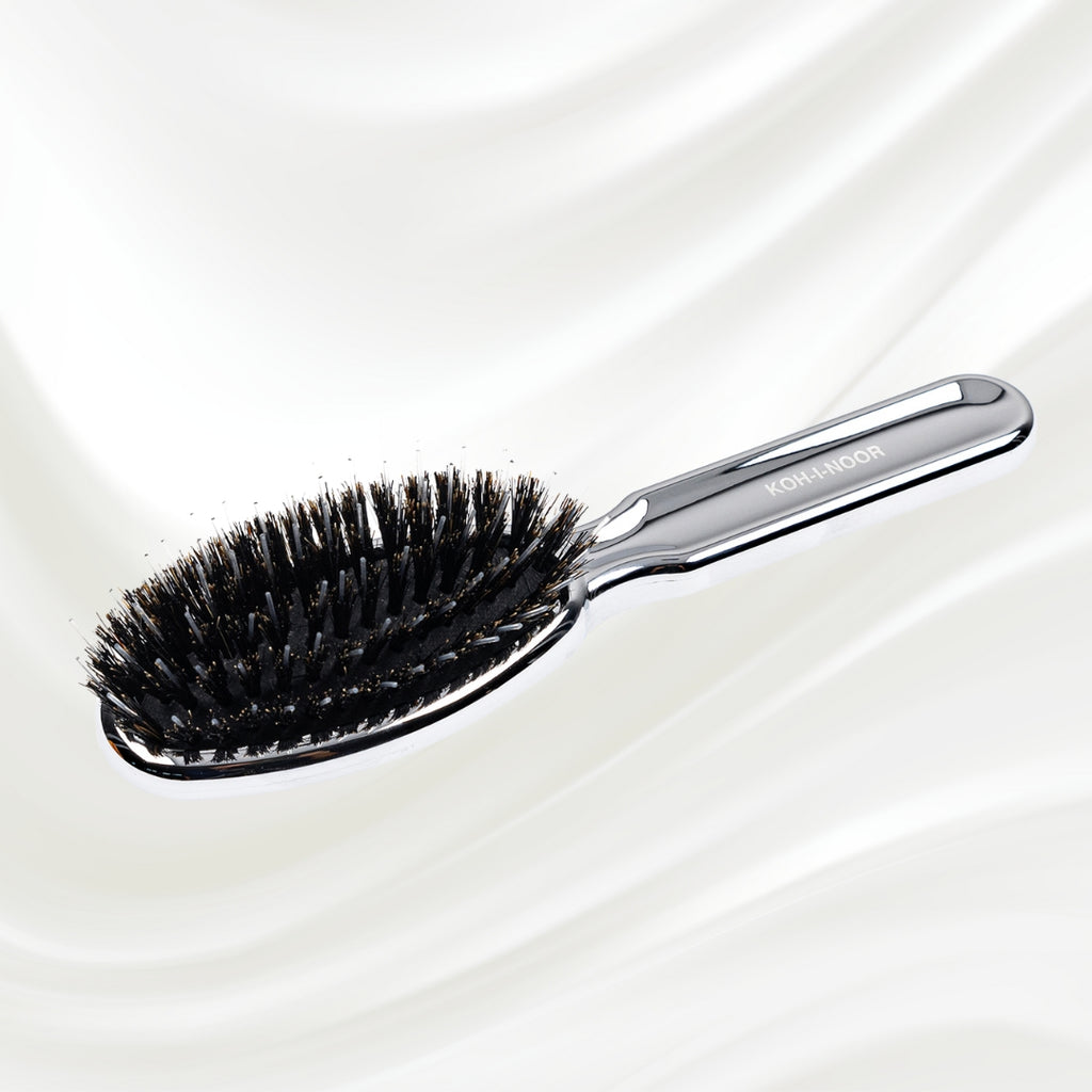 7117KK KOH-I-NOOR Metallic hairbrush with chrome plated handle, and boar and nylon bristles; KOH-I-NOOR's logo stamped on the comb