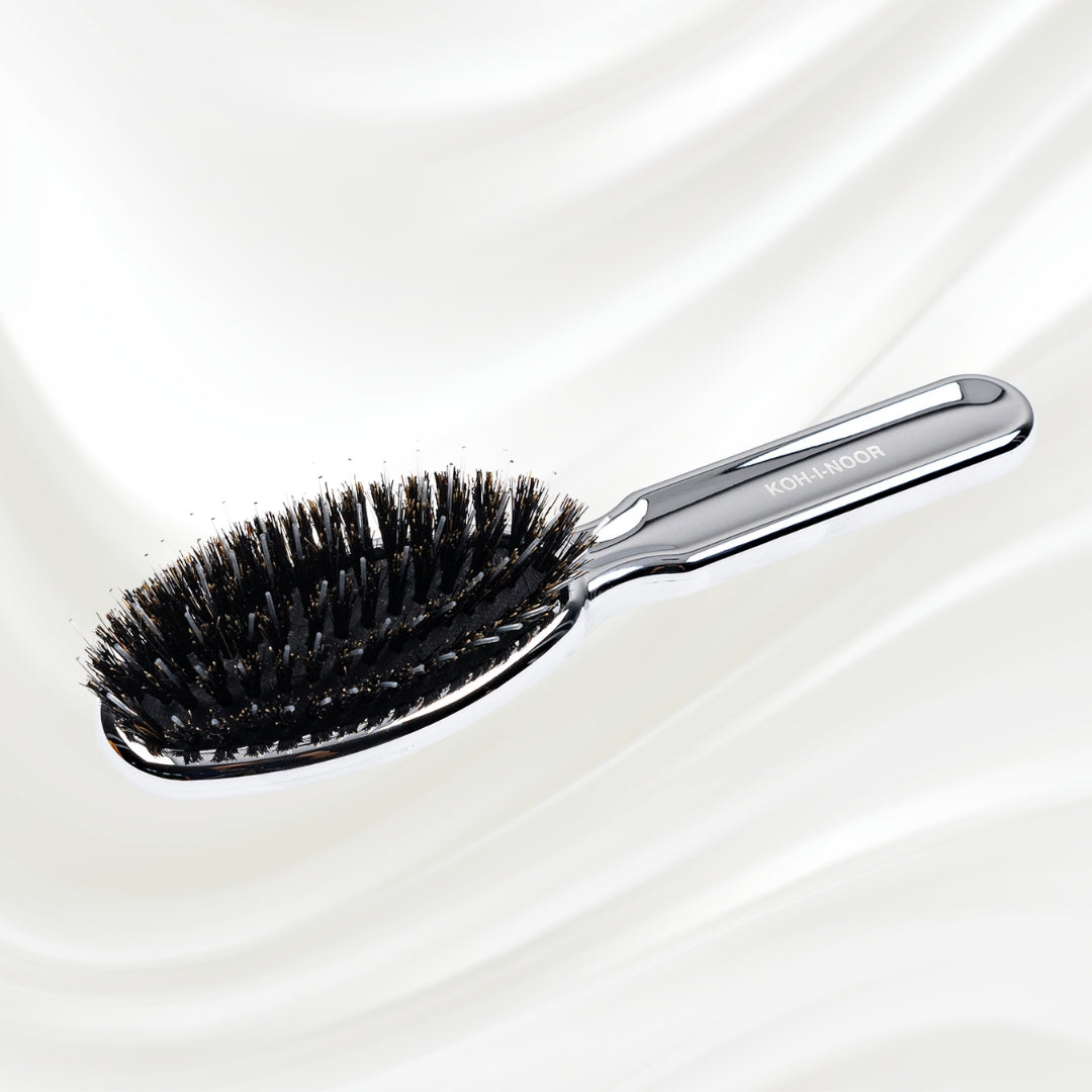 7117KK KOH-I-NOOR Metallic hairbrush with chrome plated handle, and boar and nylon bristles; KOH-I-NOOR's logo stamped on the comb