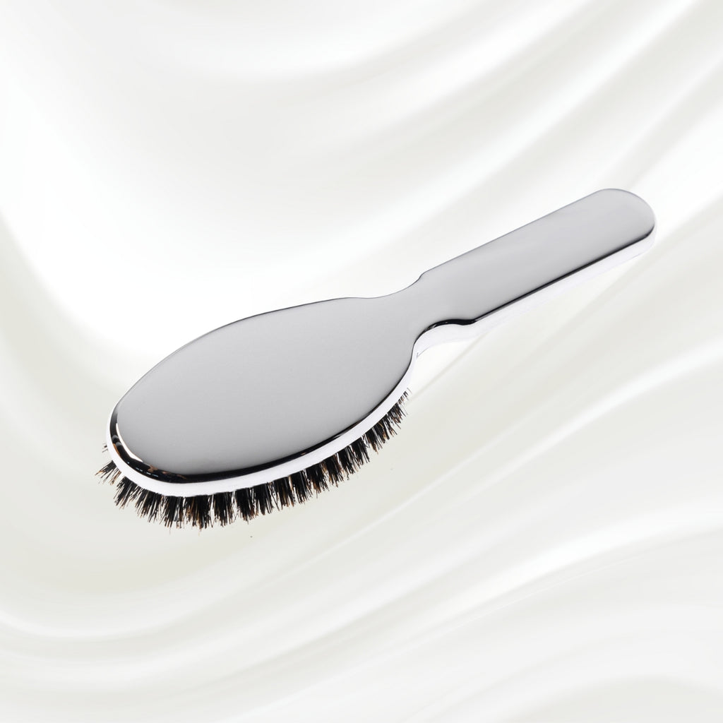 7117KK KOH-I-NOOR Metallic hairbrush with chrome plated handle, and boar and nylon bristles; KOH-I-NOOR's logo stamped on the comb