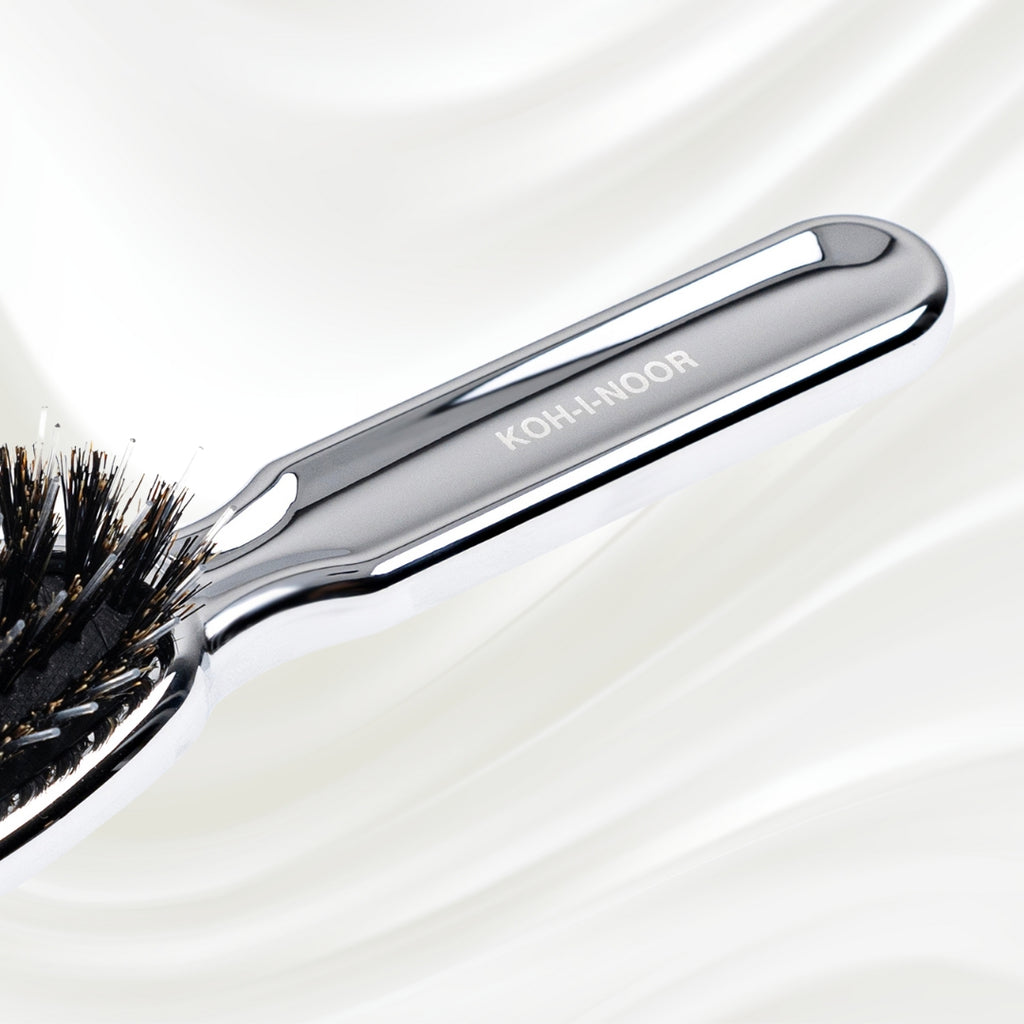 7117KK KOH-I-NOOR Metallic hairbrush with chrome plated handle, and boar and nylon bristles; KOH-I-NOOR's logo stamped on the comb