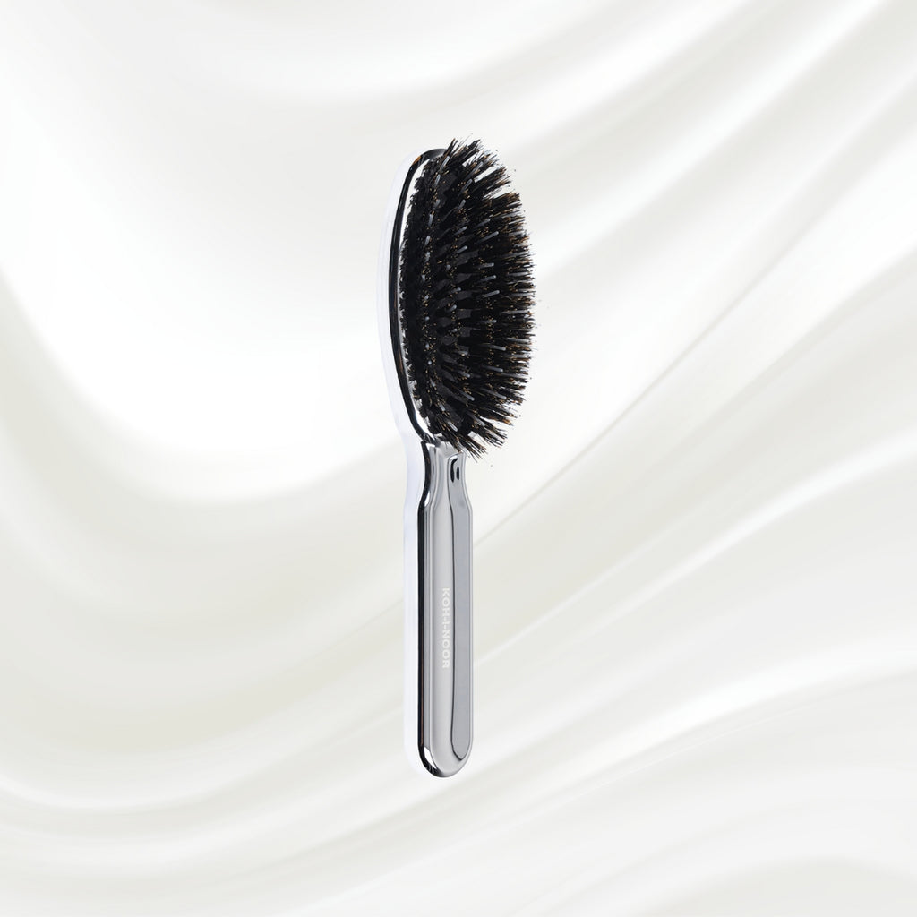 7117KK KOH-I-NOOR Metallic hairbrush with chrome plated handle, and boar and nylon bristles; KOH-I-NOOR's logo stamped on the comb