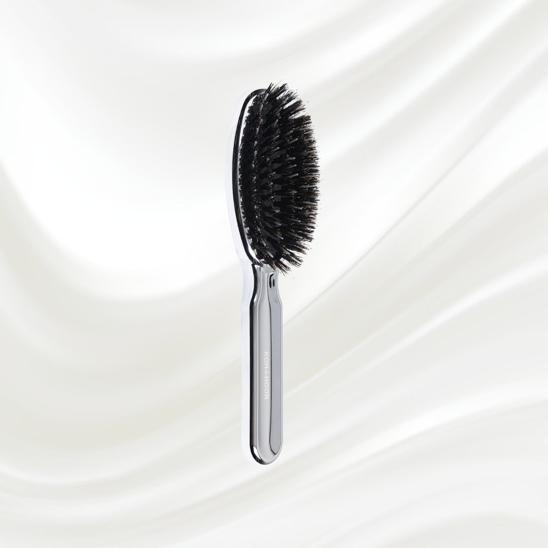 7117KK KOH-I-NOOR Metallic hairbrush with chrome plated handle, and boar and nylon bristles; KOH-I-NOOR's logo stamped on the comb