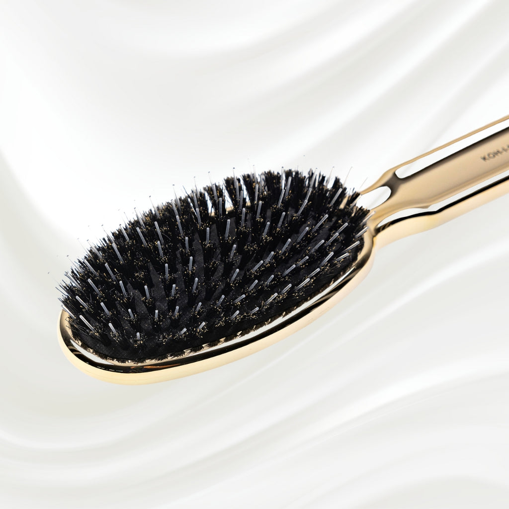 7118G KOH-I-NOOR Metallic hairbrush with gold plated handle, and boar and nylon bristles; KOH-I-NOOR's logo stamped on the comb