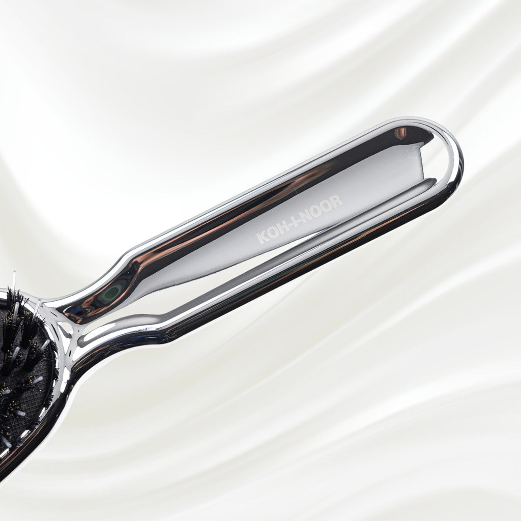 7118KK KOH-I-NOOR Metallic hairbrush with chrome plated handle, and boar and nylon bristles; KOH-I-NOOR's logo stamped on the comb