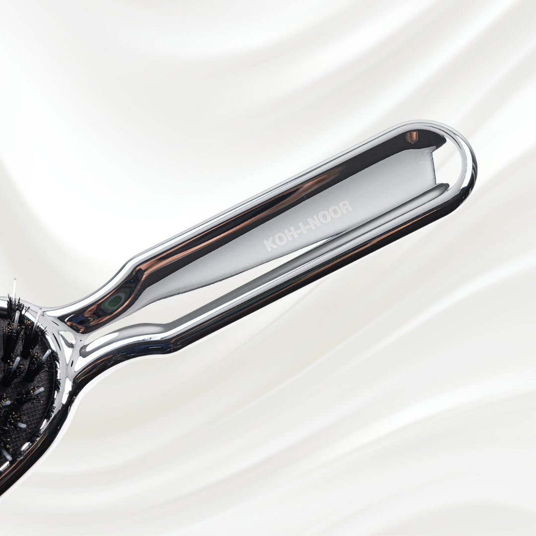 7118KK KOH-I-NOOR Metallic hairbrush with chrome plated handle, and boar and nylon bristles; KOH-I-NOOR's logo stamped on the comb