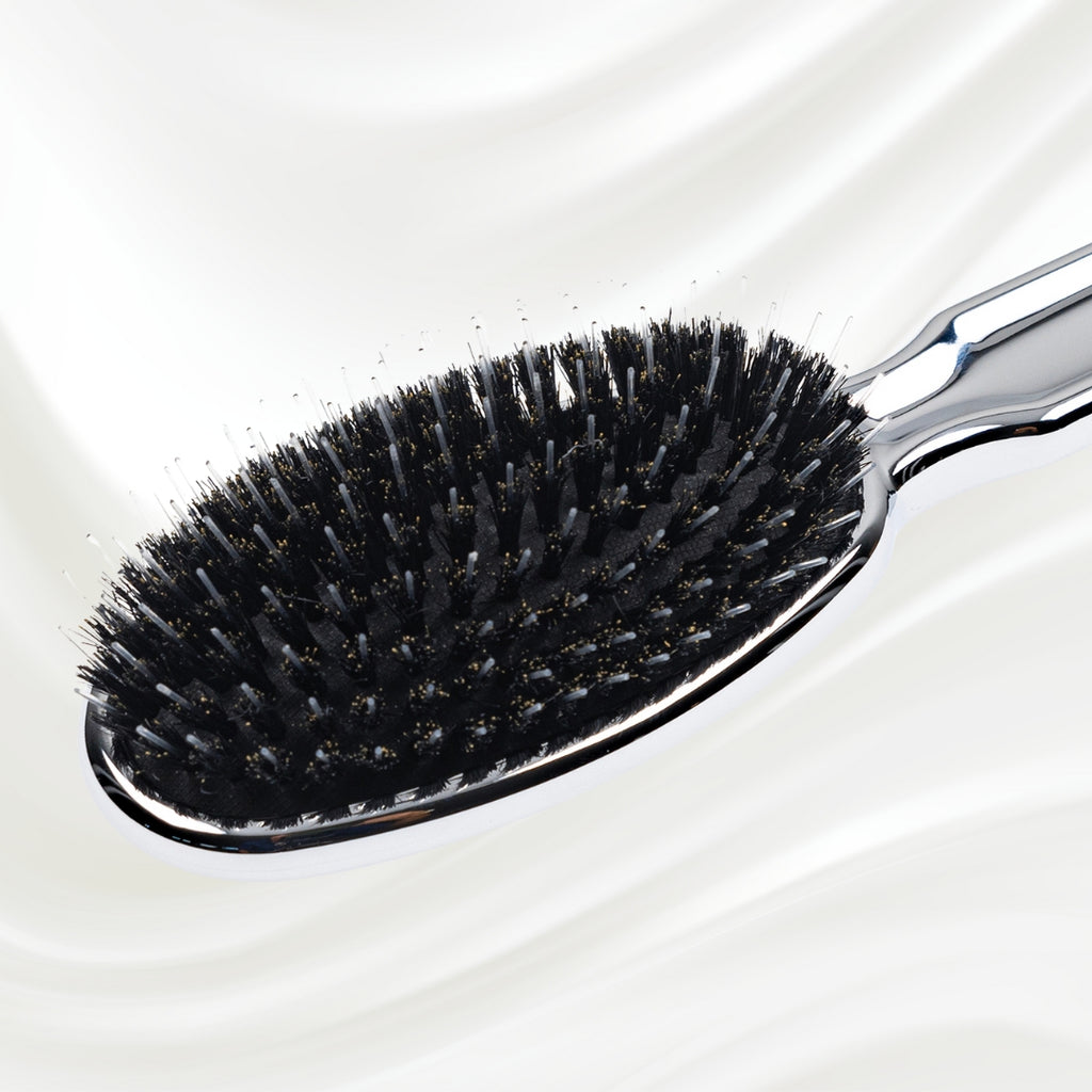 7118KK KOH-I-NOOR Metallic hairbrush with chrome plated handle, and boar and nylon bristles; KOH-I-NOOR's logo stamped on the comb