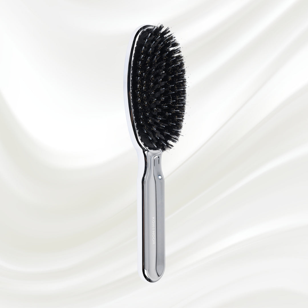 7118KK KOH-I-NOOR Metallic hairbrush with chrome plated handle, and boar and nylon bristles; KOH-I-NOOR's logo stamped on the comb
