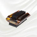 tortoiseshell nail brush with black boar bristle on two sides. KOH-I-NOOR golden logo printed on the side