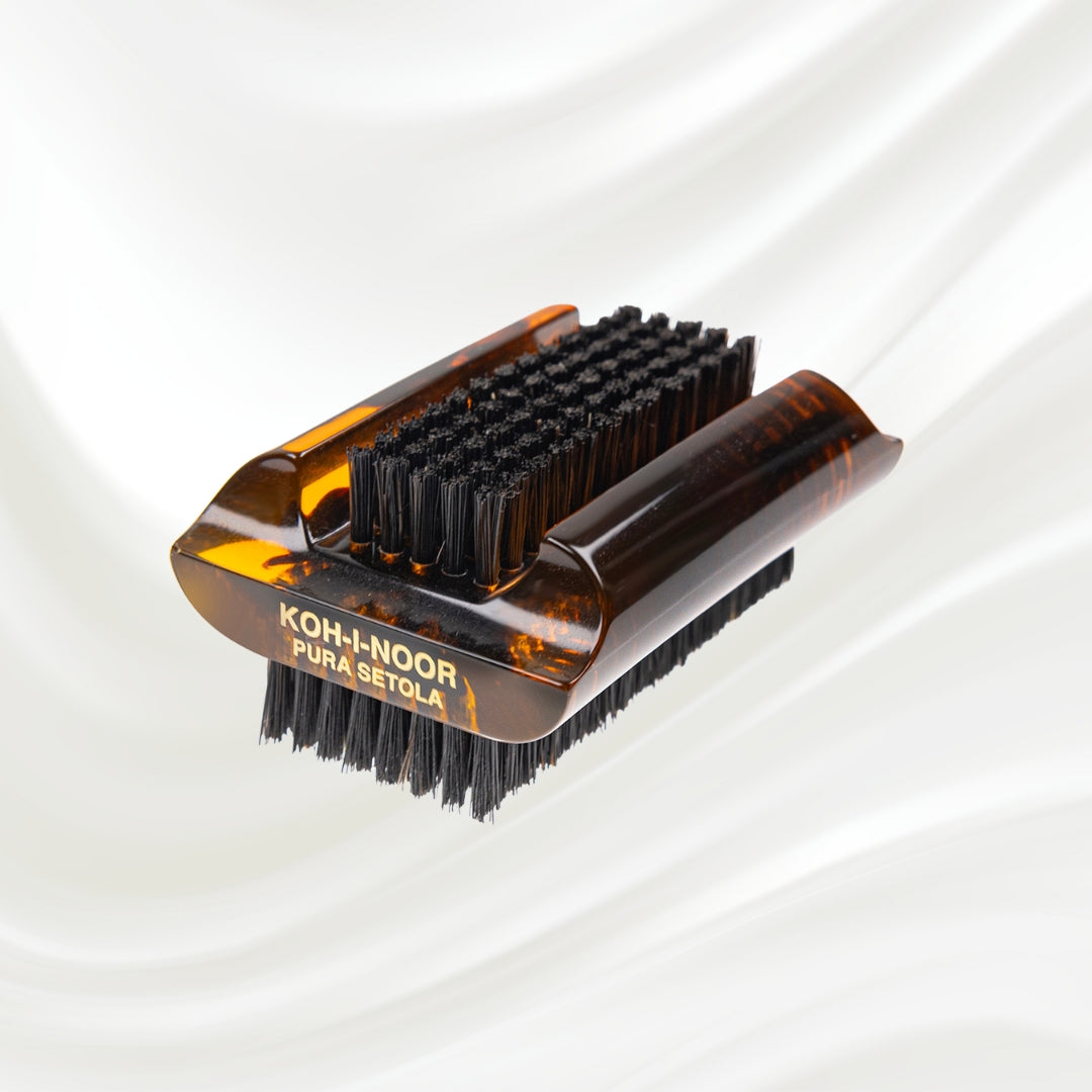 tortoiseshell nail brush with black boar bristle on two sides. KOH-I-NOOR golden logo printed on the side