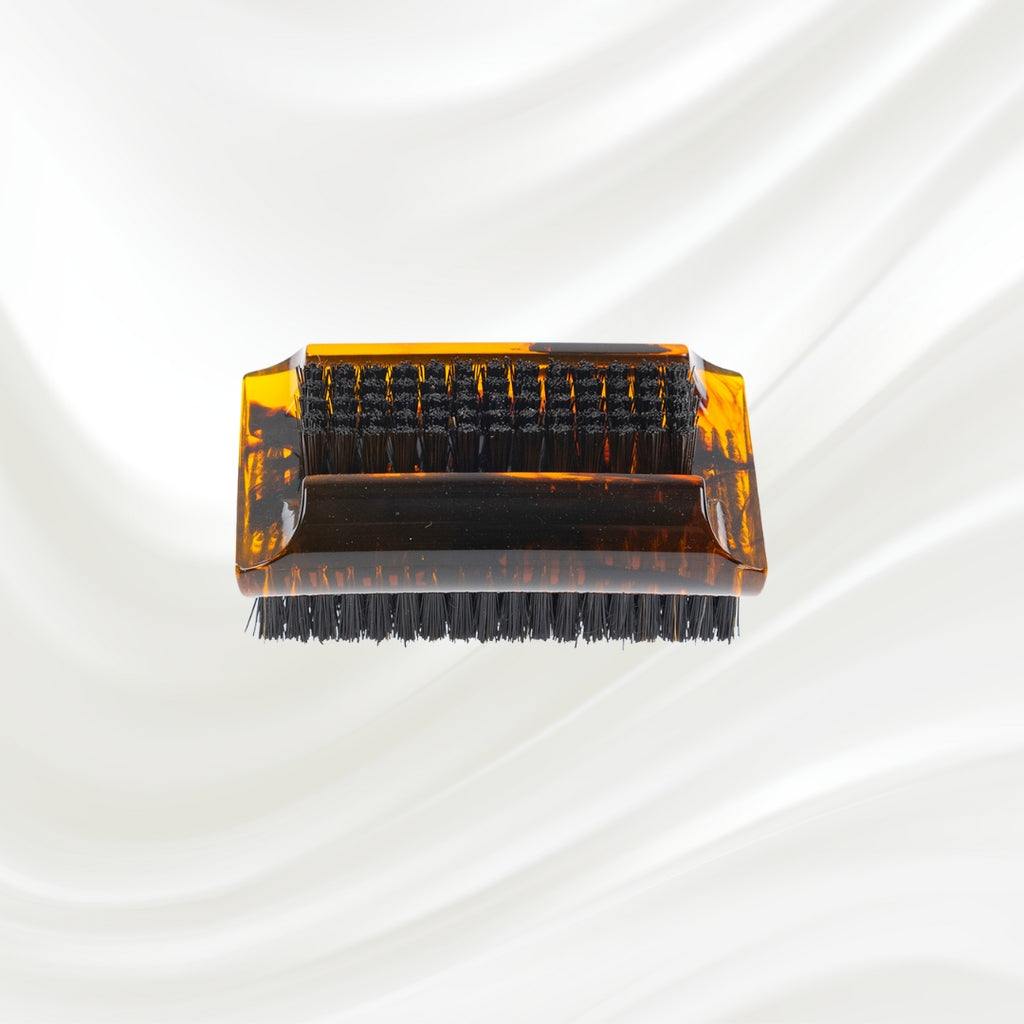 tortoiseshell nail brush with black boar bristle on two sides. KOH-I-NOOR golden logo printed on the side