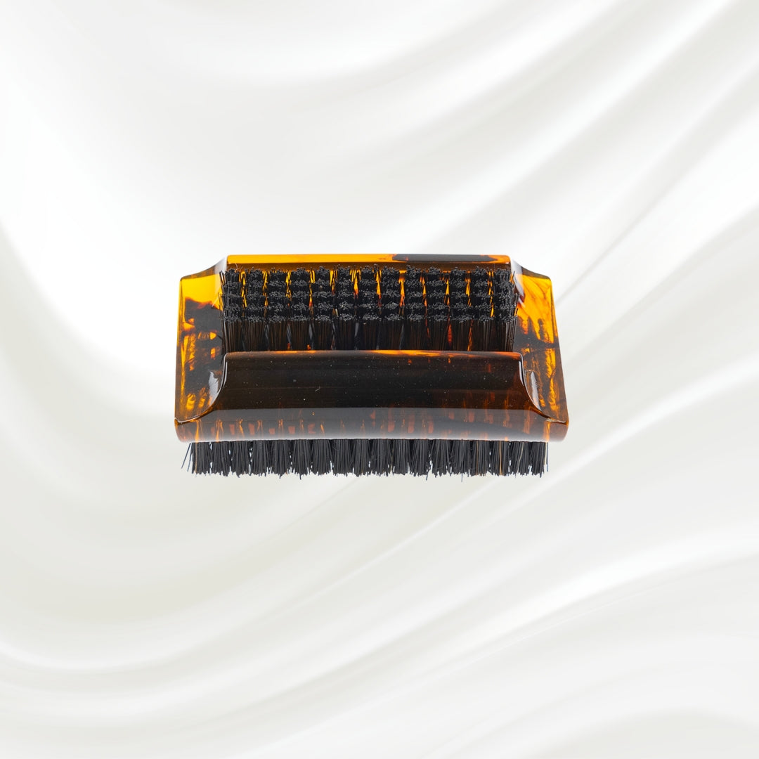 tortoiseshell nail brush with black boar bristle on two sides. KOH-I-NOOR golden logo printed on the side