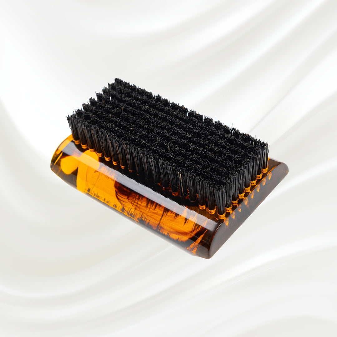 tortoiseshell nail brush with black boar bristle on two sides. KOH-I-NOOR golden logo printed on the side