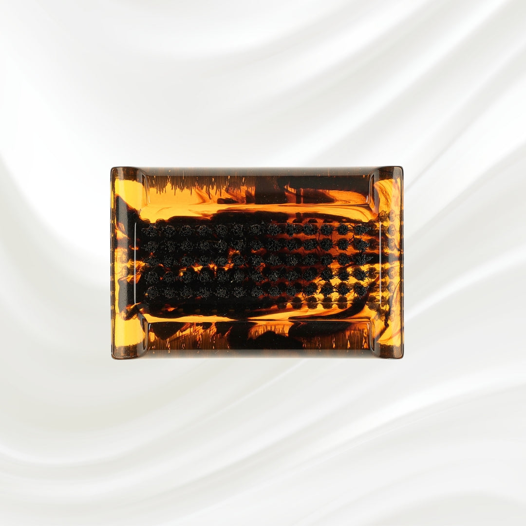 tortoiseshell nail brush with black boar bristle on two sides. KOH-I-NOOR golden logo printed on the side