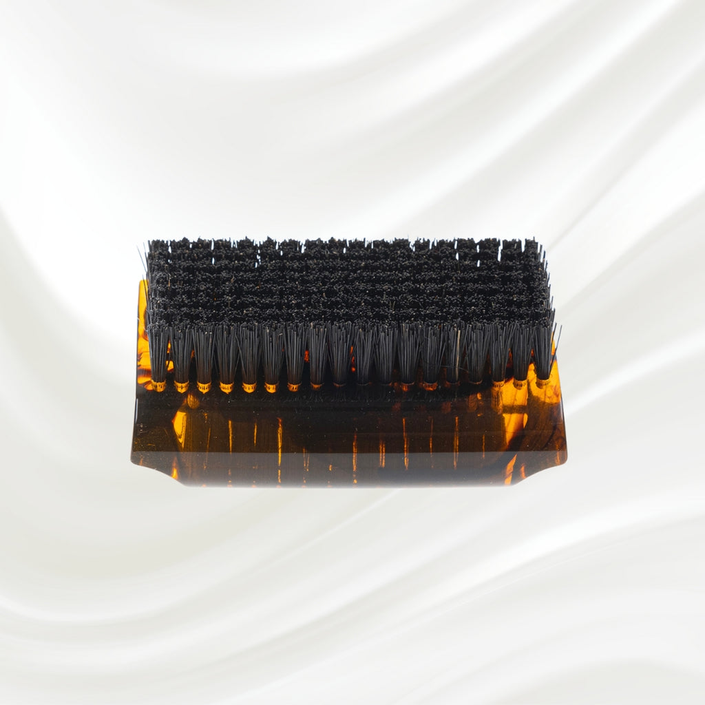 tortoiseshell nail brush with black boar bristle on two sides. KOH-I-NOOR golden logo printed on the side