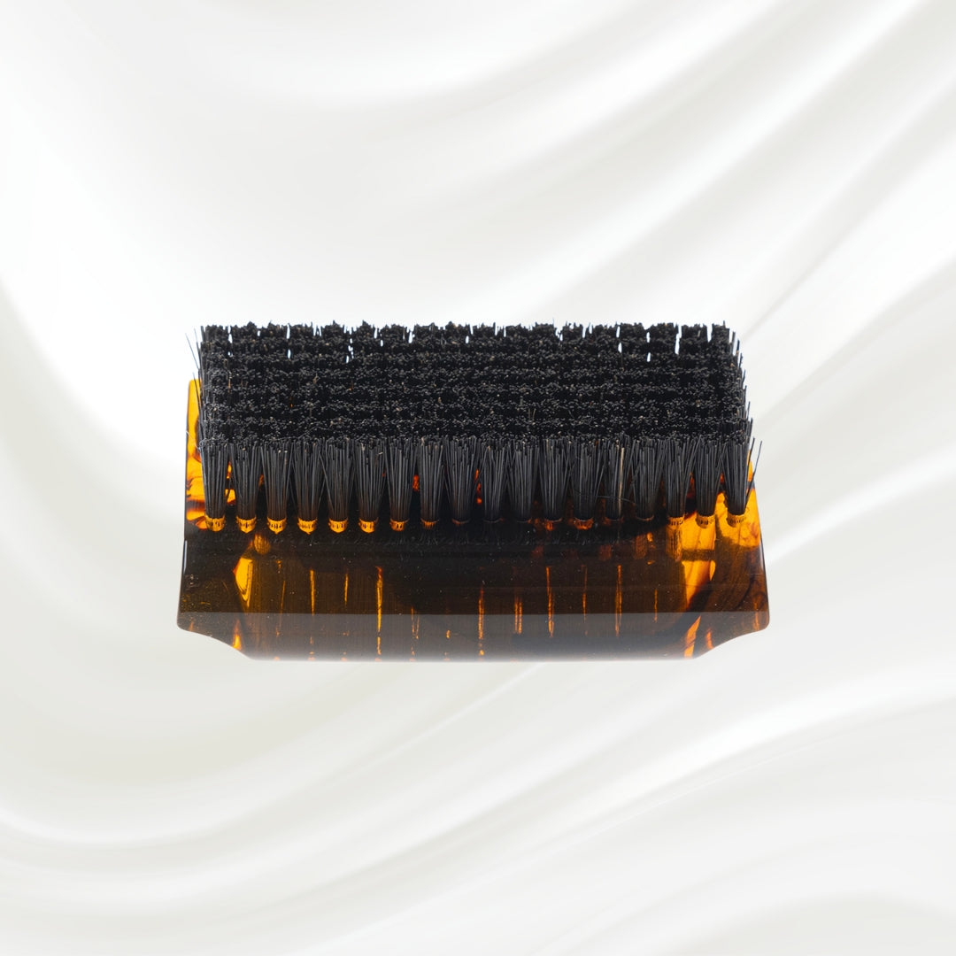 tortoiseshell nail brush with black boar bristle on two sides. KOH-I-NOOR golden logo printed on the side