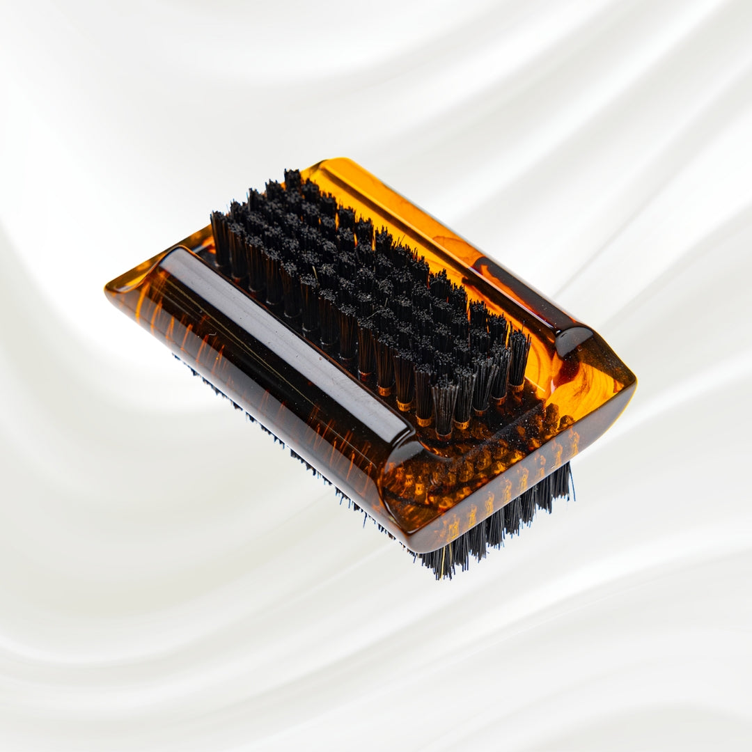 tortoiseshell nail brush with black boar bristle on two sides. KOH-I-NOOR golden logo printed on the side