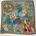 blue silk scarf depicting flowers, a peacock and two opera characters
