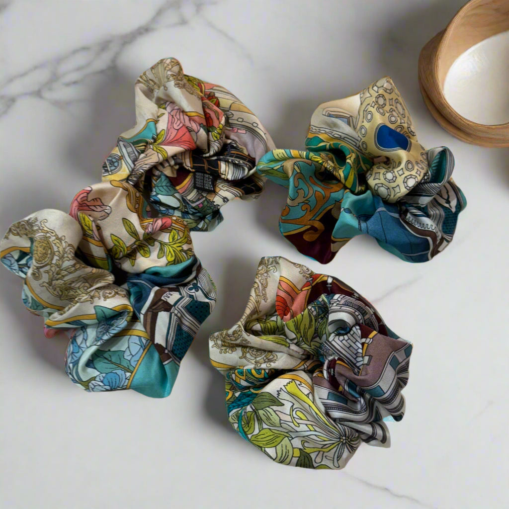 silk scrunchie with bluye and white floral patterns